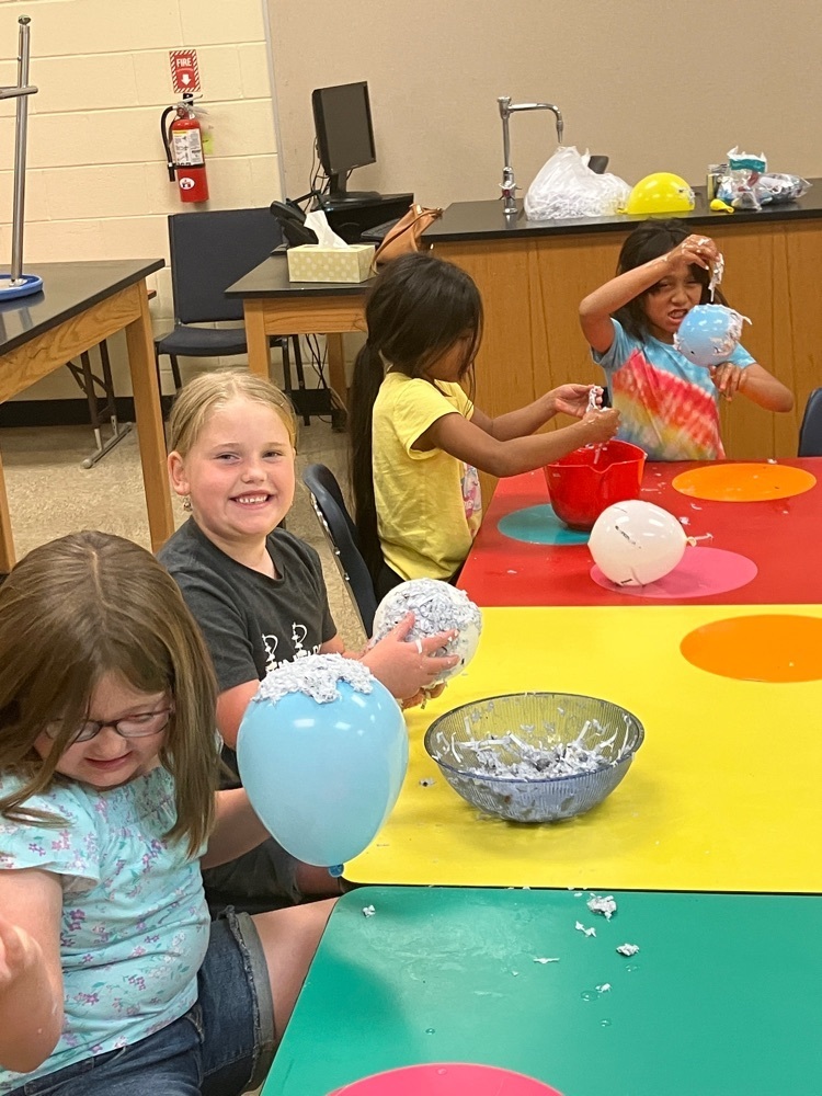 Summer Camp fun with paper mache, gaming, and archery!